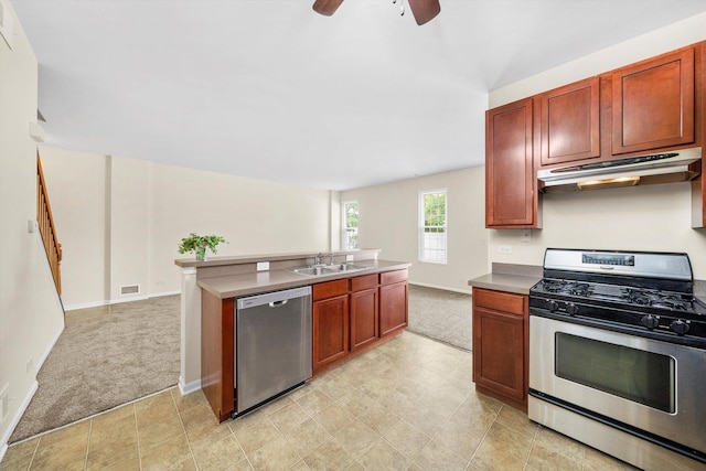 1133 Heron Cir, Joliet, IL 60431 - kitchen featuring appliances with stainless steel finishes, under cabinet range hood, light carpet, and a sink