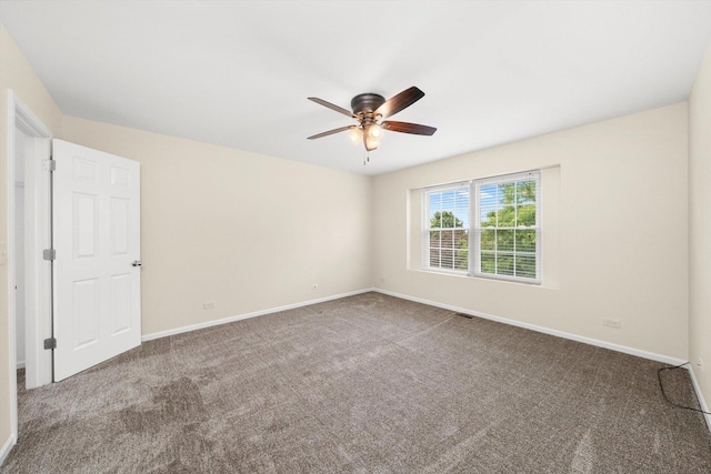 1133 Heron Cir, Joliet, IL 60431 - carpeted empty room with ceiling fan and baseboards