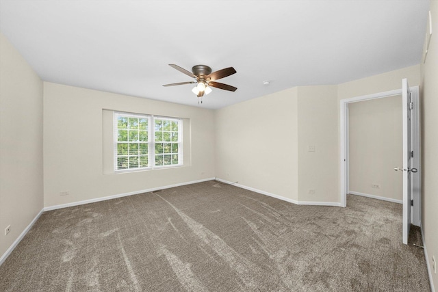 1133 Heron Cir, Joliet, IL 60431 - carpeted empty room featuring a ceiling fan and baseboards