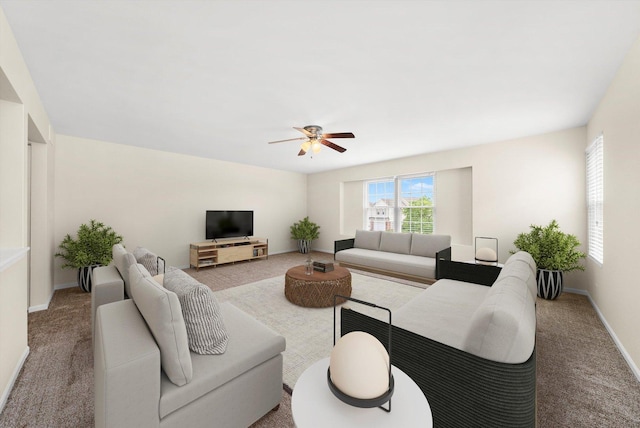 1133 Heron Cir, Joliet, IL 60431 - living area featuring carpet flooring, ceiling fan, and baseboards