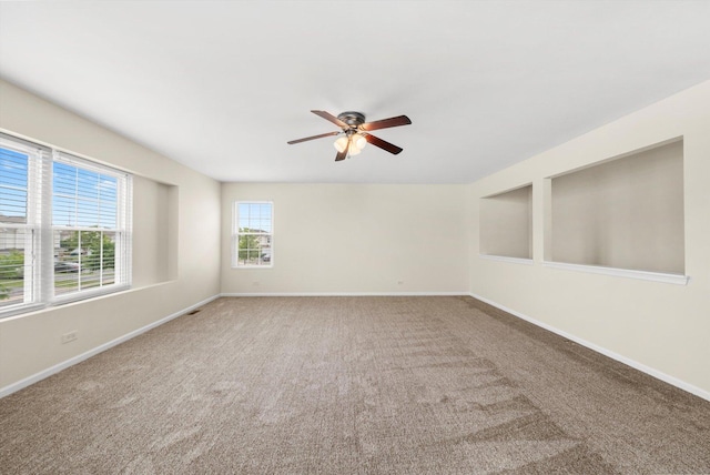 1133 Heron Cir, Joliet, IL 60431 - carpeted spare room with a ceiling fan and baseboards