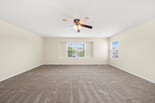 1133 Heron Cir, Joliet, IL 60431 - carpeted spare room featuring ceiling fan and baseboards
