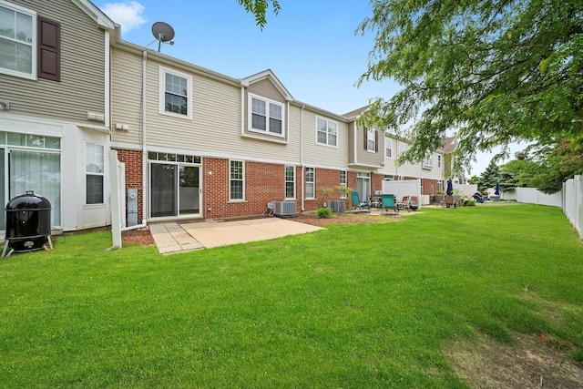 1133 Heron Cir, Joliet, IL 60431 - back of house featuring cooling unit, a patio, and brick siding