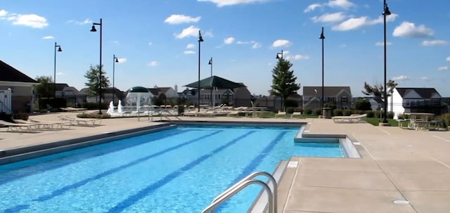 1133 Heron Cir, Joliet, IL 60431 - community pool with a patio and a residential view