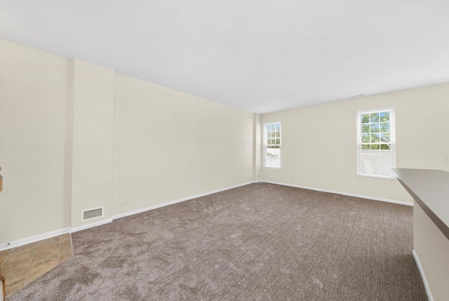 1133 Heron Cir, Joliet, IL 60431 - carpeted empty room with baseboards