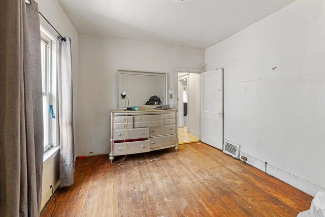7637 S Ridgeland Ave, Chicago, IL 60649 - bedroom with hardwood / wood-style flooring and ornamental molding