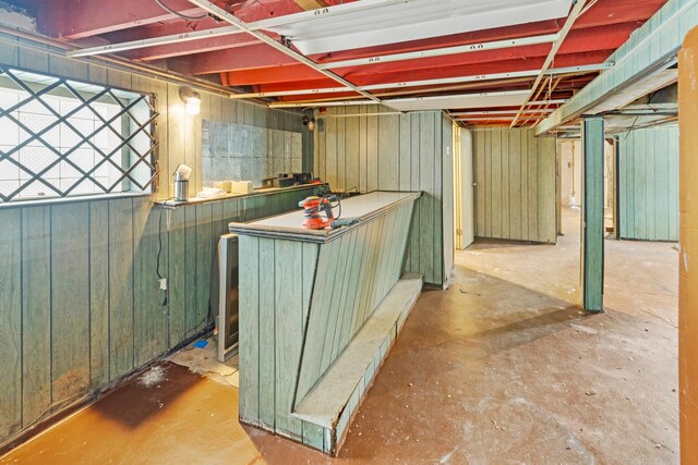 7637 S Ridgeland Ave, Chicago, IL 60649 - basement with a bar and wooden walls