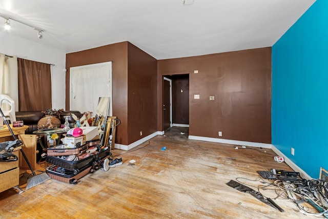 7637 S Ridgeland Ave, Chicago, IL 60649 - unfurnished room featuring baseboards and wood finished floors