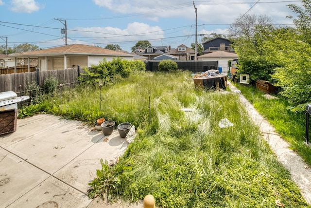 7637 S Ridgeland Ave, Chicago, IL 60649 - view of yard with a patio area