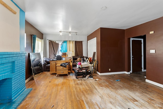 7637 S Ridgeland Ave, Chicago, IL 60649 - living area with wood-type flooring and baseboards