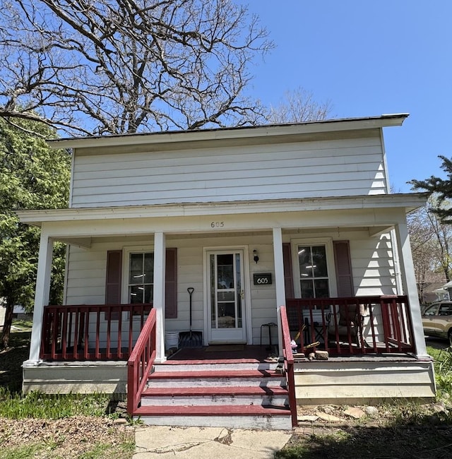605 N Jefferson St, Harvard, IL 60033 - view of front of house featuring a porch