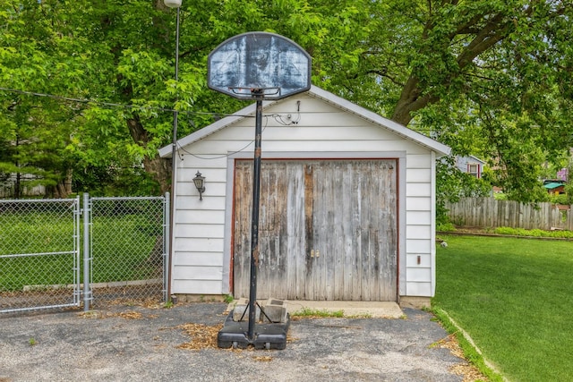 605 N Jefferson St, Harvard, IL 60033 - view of shed with a gate