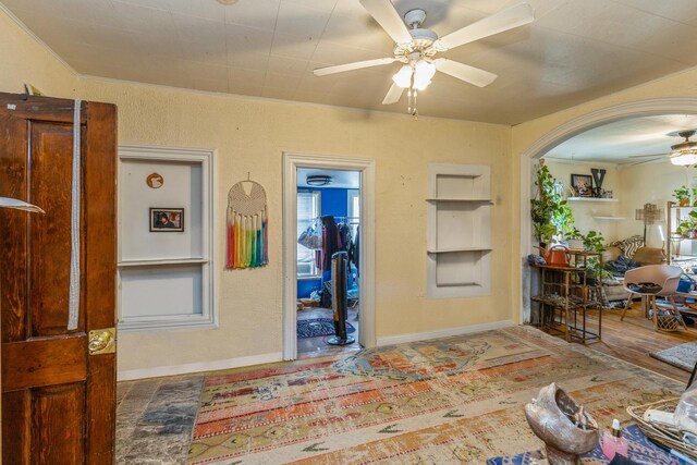 605 N Jefferson St, Harvard, IL 60033 - foyer featuring a ceiling fan and ornamental molding