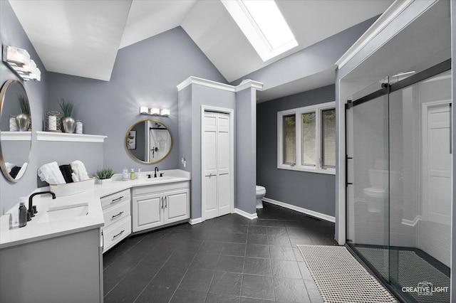 1033 Forest Trl, Sugar Grove, IL 60554 - bathroom with a skylight, vanity, vaulted ceiling, a stall shower, and tile patterned flooring