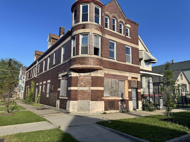 8401 S Brandon Ave, Chicago, IL 60617 - property entrance with brick siding