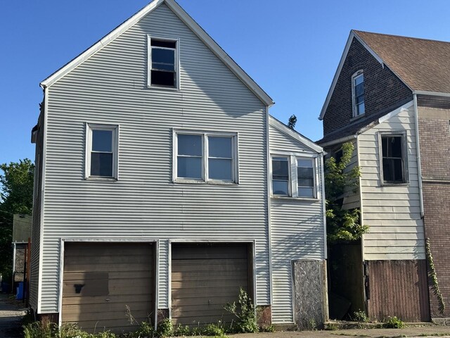 8401 S Brandon Ave, Chicago, IL 60617 - view of front of home with an attached garage