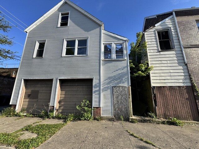 8401 S Brandon Ave, Chicago, IL 60617 - view of property exterior featuring brick siding