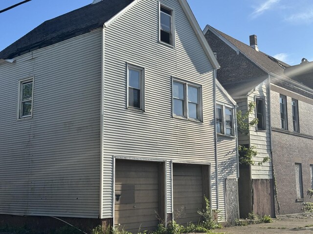 8401 S Brandon Ave, Chicago, IL 60617 - view of property exterior featuring a garage