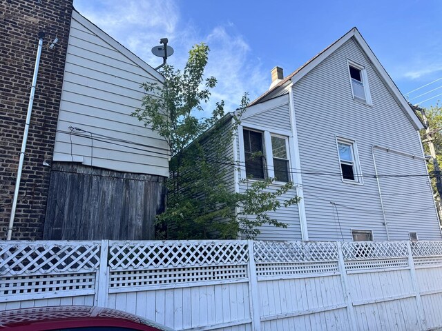 8401 S Brandon Ave, Chicago, IL 60617 - view of side of home featuring brick siding