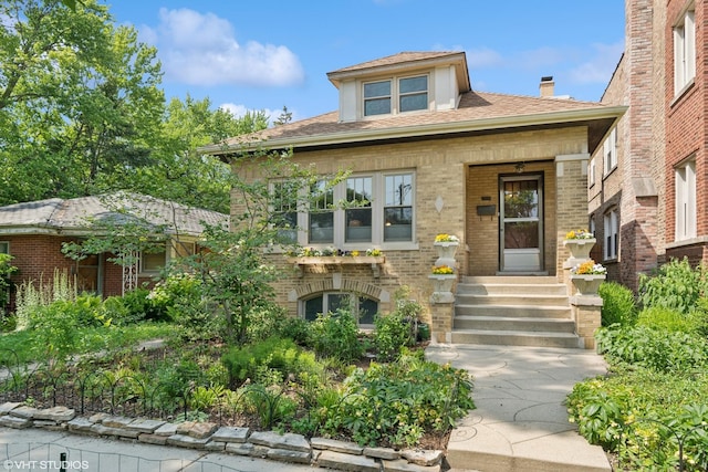 2558 W Cullom Ave, Chicago, IL 60618 - view of front facade featuring brick siding and roof with shingles
