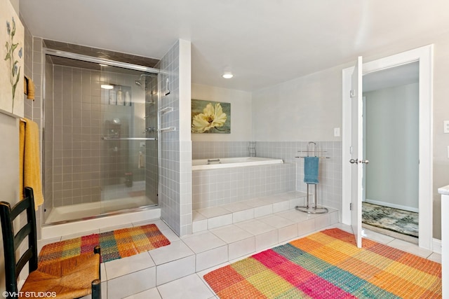 2558 W Cullom Ave, Chicago, IL 60618 - full bath with tile patterned floors, a bath, and a shower stall