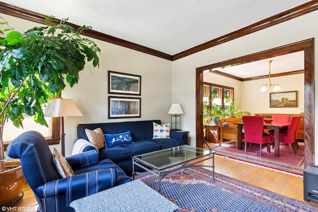 2558 W Cullom Ave, Chicago, IL 60618 - living room with wood finished floors, a chandelier, and ornamental molding