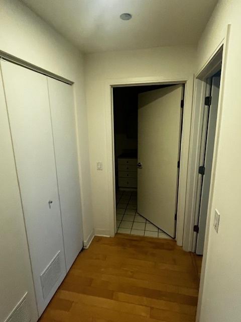 8 E Randolph St Unit 3206, Chicago, IL 60601 - corridor featuring light wood finished floors
