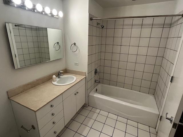 8 E Randolph St Unit 3206, Chicago, IL 60601 - full bathroom featuring tile patterned flooring, vanity, and tub / shower combination