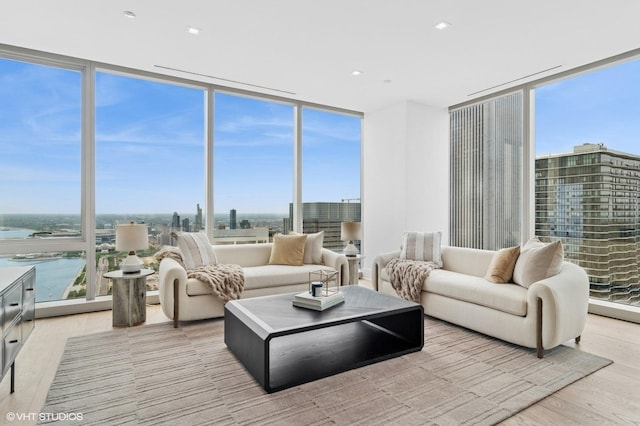 363 E Wacker Dr Unit 6301, Chicago, IL 60601 - living area featuring floor to ceiling windows, healthy amount of natural light, and light wood finished floors
