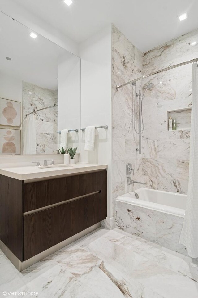 363 E Wacker Dr Unit 6301, Chicago, IL 60601 - full bath featuring a combined bath / shower with marble appearance, vanity, and marble finish floors