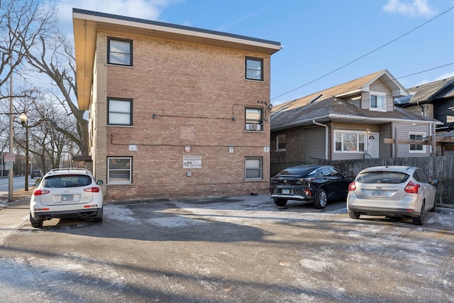 2 Le Moyne Pkwy Unit 3N, Oak Park, IL 60302 - view of side of property with brick siding and uncovered parking