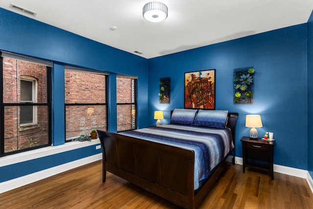 4872 N Kenmore Ave Unit 1, Chicago, IL 60640 - bedroom with baseboards and wood finished floors