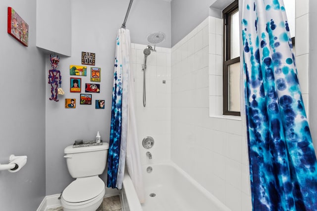 4872 N Kenmore Ave Unit 1, Chicago, IL 60640 - bathroom with shower / bath combo with shower curtain and toilet