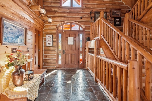2317 Paulson Rd, Harvard, IL 60033 - entryway featuring log walls and stairway