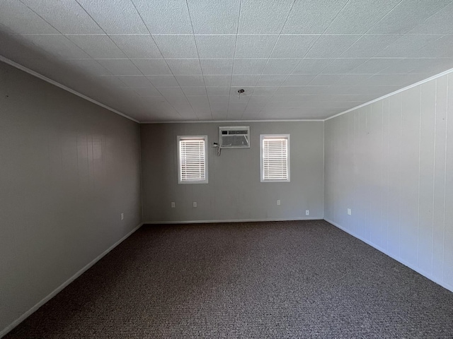 409 Winnemac St, Park Forest, IL 60466 - empty room with ornamental molding, a wall mounted air conditioner, dark carpet, and baseboards