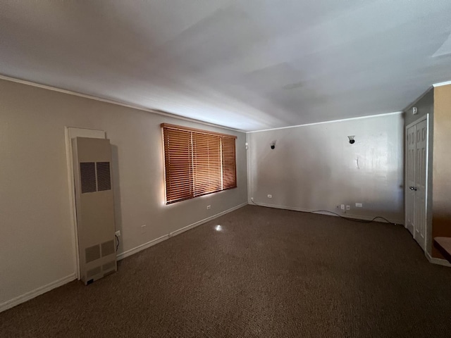 409 Winnemac St, Park Forest, IL 60466 - carpeted spare room featuring a heating unit and baseboards