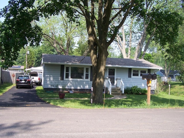 1711 Beach Rd, Mchenry, IL 60050 - single story home featuring a front yard