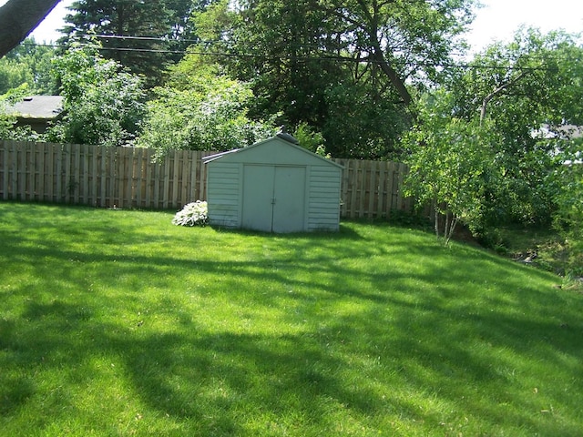 1711 Beach Rd, Mchenry, IL 60050 - fenced backyard with a shed