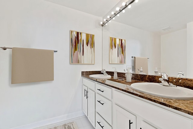 1629 S Prairie Ave Unit 1803, Chicago, IL 60616 - bathroom with double vanity and tile patterned floors