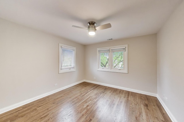 19 S Home Ave, Park Ridge, IL 60068 - unfurnished room featuring wood finished floors, baseboards, and a ceiling fan