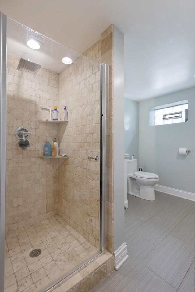 889 S Golf Cul De Sac St, Des Plaines, IL 60016 - bathroom with a stall shower and baseboards