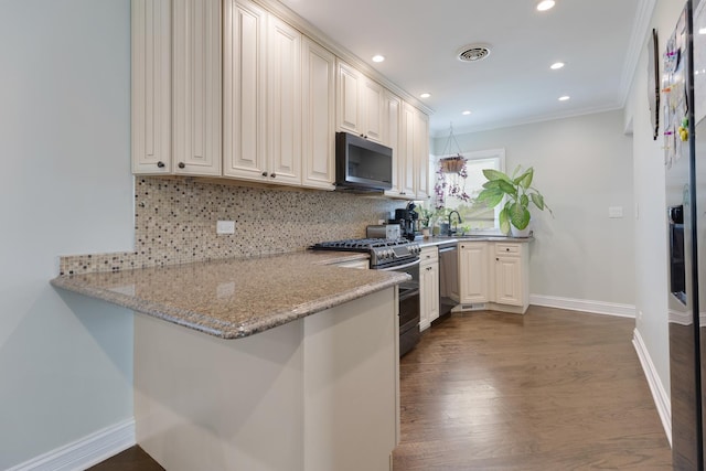 889 S Golf Cul De Sac St, Des Plaines, IL 60016 - kitchen featuring appliances with stainless steel finishes, a peninsula, tasteful backsplash, dark wood-style floors, and crown molding