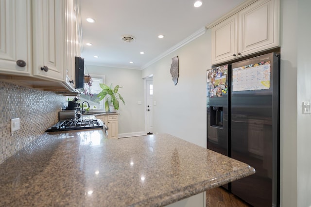 889 S Golf Cul De Sac St, Des Plaines, IL 60016 - kitchen featuring fridge with ice dispenser, decorative backsplash, crown molding, a peninsula, and range