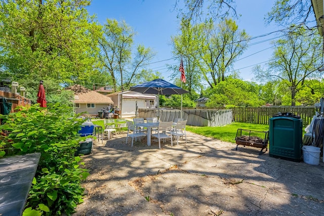 1032 S Maple Ave, Oak Park, IL 60304 - view of patio / terrace featuring outdoor dining space and an outbuilding