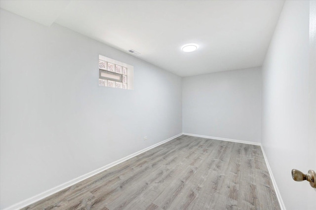 1019 W 47th Pl, Chicago, IL 60609 - unfurnished room featuring wood finished floors and baseboards