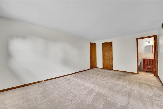 901 E Ardyce Ln, Mount Prospect, IL 60056 - unfurnished bedroom featuring light carpet and connected bathroom