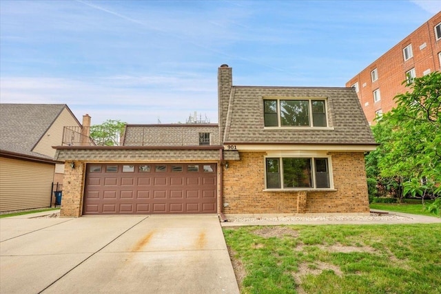 901 E Ardyce Ln, Mount Prospect, IL 60056 - view of front facade featuring mansard roof, a shingled roof, concrete driveway, a garage, and brick siding