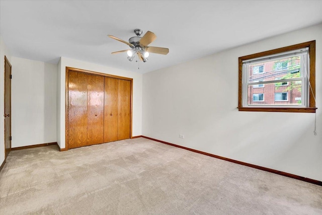 901 E Ardyce Ln, Mount Prospect, IL 60056 - unfurnished bedroom with light colored carpet, a closet, and a ceiling fan
