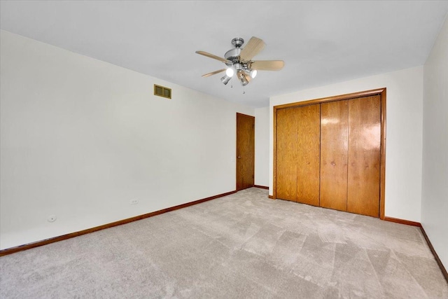 901 E Ardyce Ln, Mount Prospect, IL 60056 - unfurnished bedroom with light colored carpet, a closet, and ceiling fan