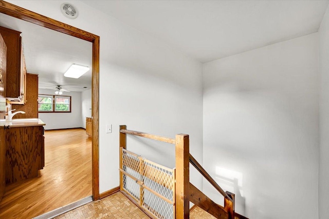 901 E Ardyce Ln, Mount Prospect, IL 60056 - corridor with an upstairs landing and light wood-style floors
